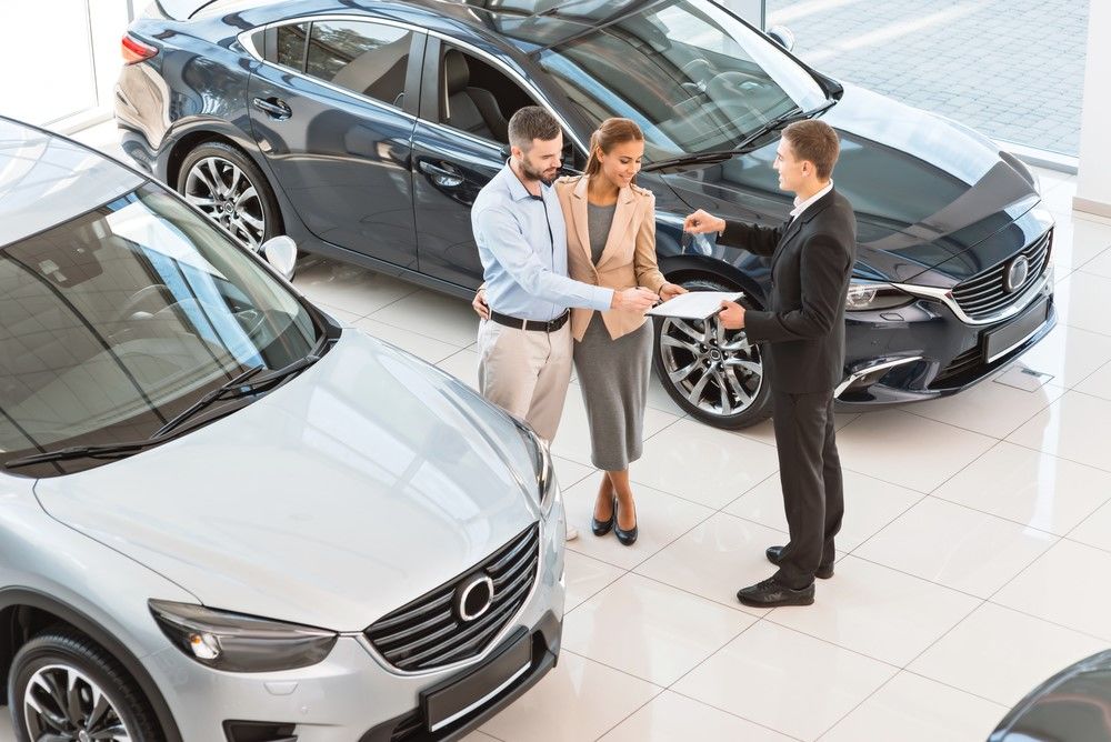 When buying a car from store a dealer what do i need